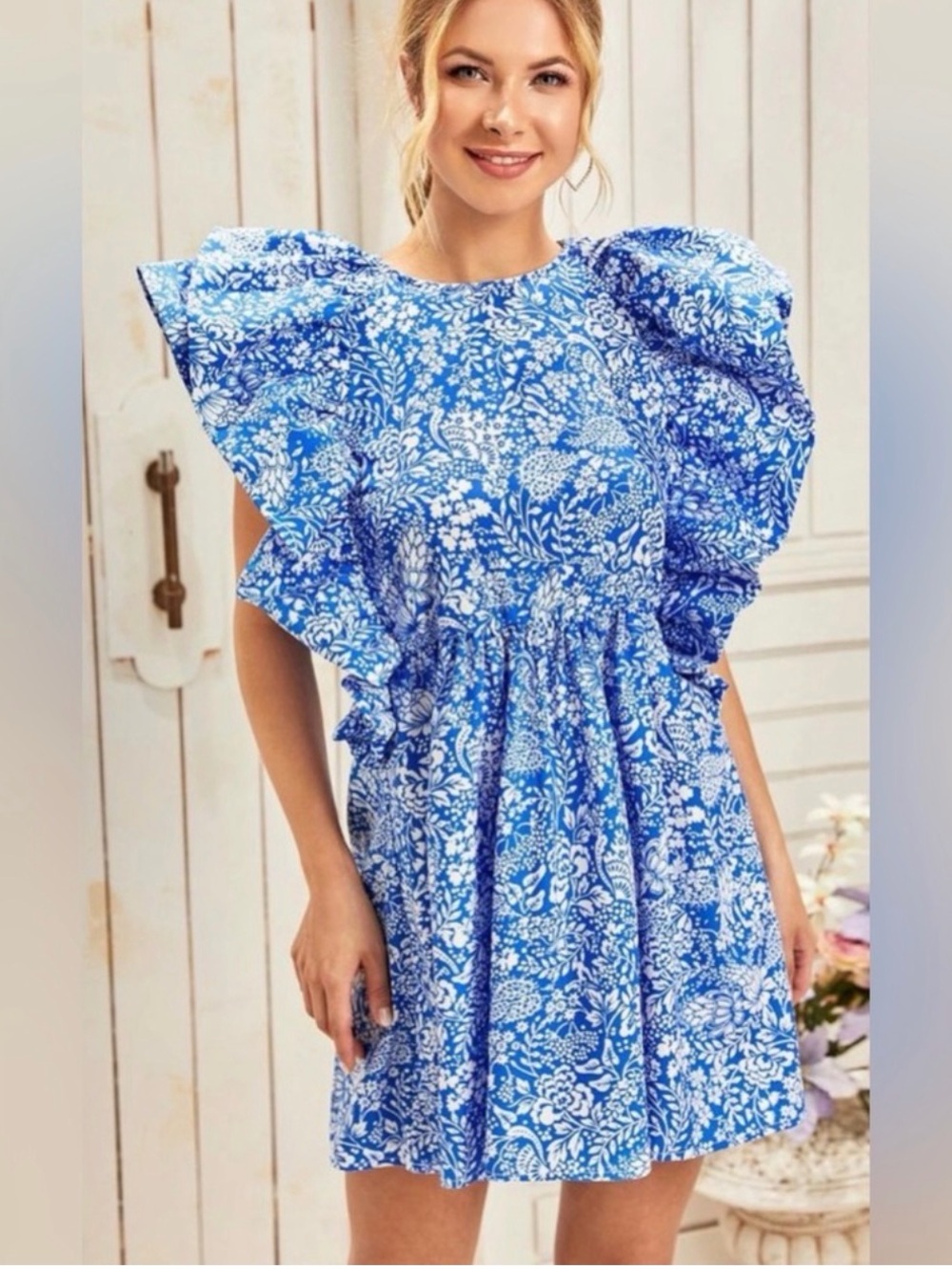 Zara women’s floral flutter sleeve dress
